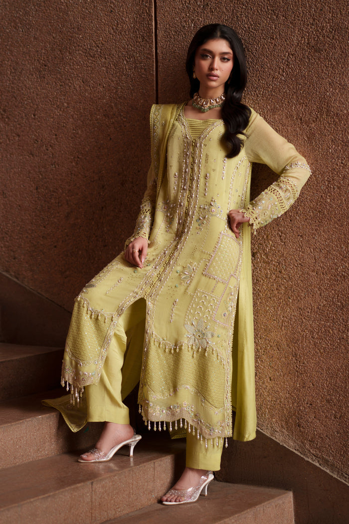 Full-length view of Pedro lime green embroidered khadi net gown featuring elegant panel detailing, straight trousers and embroidered organza dupatta