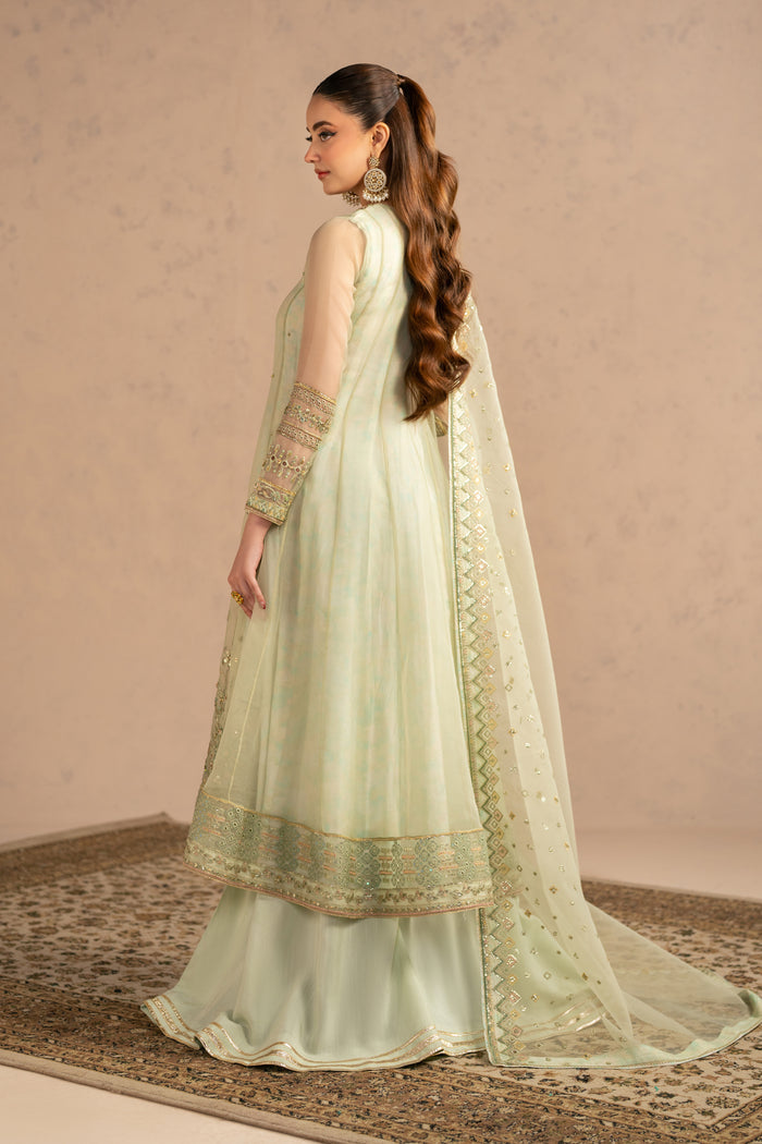 Back angled view showing soft flare and balanced silhouette with long frock style, suitable for nikkah and engagement events.