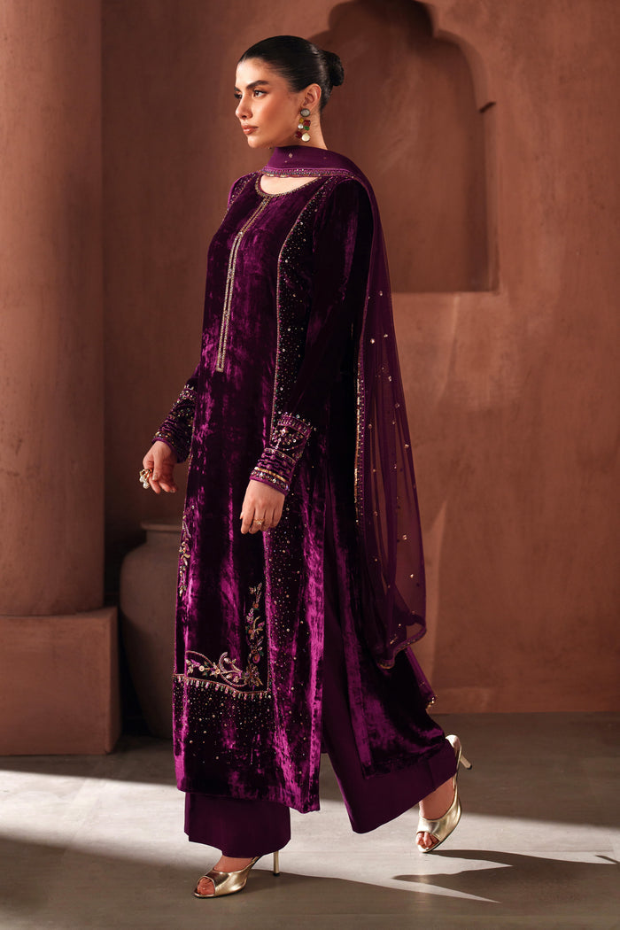 Full-length side view of NAQSHI purple velvet formal outfit showing flowing cut, detailed embroidery, and event-ready stitched finish