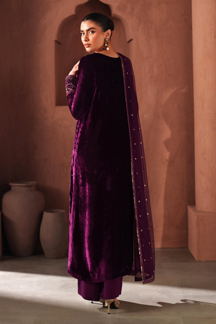 Back view of NAQSHI ready-to-wear velvet formal dress in rich purple color, featuring a clean fall and polished event look