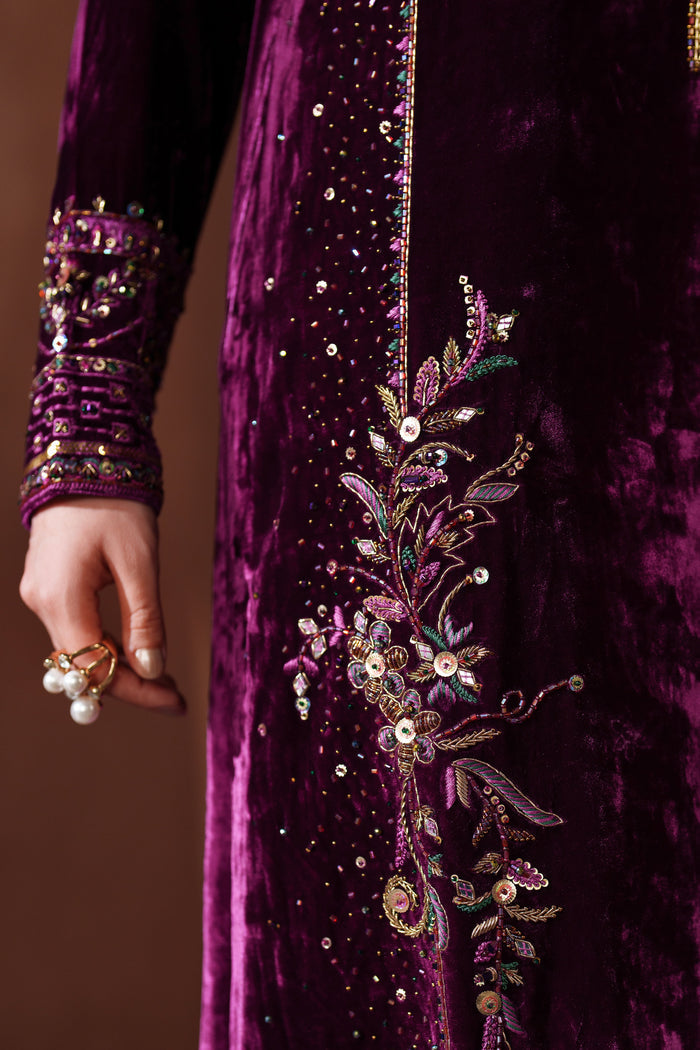 Close-up of NAQSHI velvet dress embroidery with fine thread and sequin work, highlighting premium craft for formal and festive wear