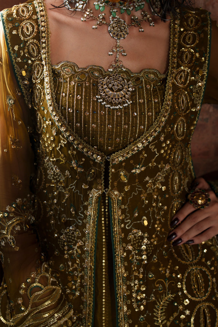 Sillage olive green outfit close-up showing neckline embroidery, sequins and adda work.