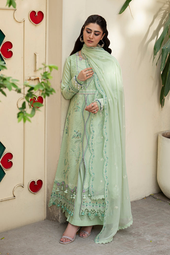 Tasveeb mint green embroidered lawn dress styled for summer gatherings with detailed floral embroidery, lace accents and elegant Eastern silhouette