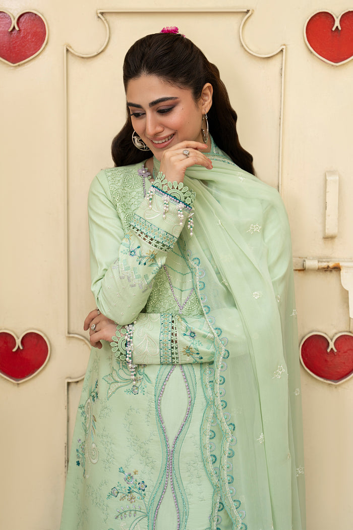 Close-up portrait of Tasveeb mint green lawn shirt featuring embroidered neckline, floral motifs and delicate handcrafted detailing