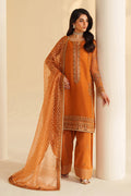 NAQSHI burnt orange ready-to-wear formal dress with fine embroidery and sheer dupatta, styled for festive and party events
