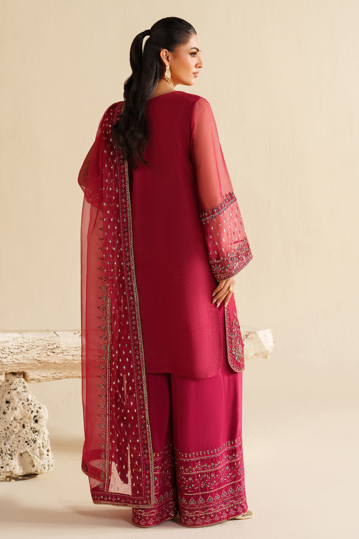 Back view of NAQSHI deep red formal ready-to-wear outfit showing clean fall, embroidered borders, and complete stitched look