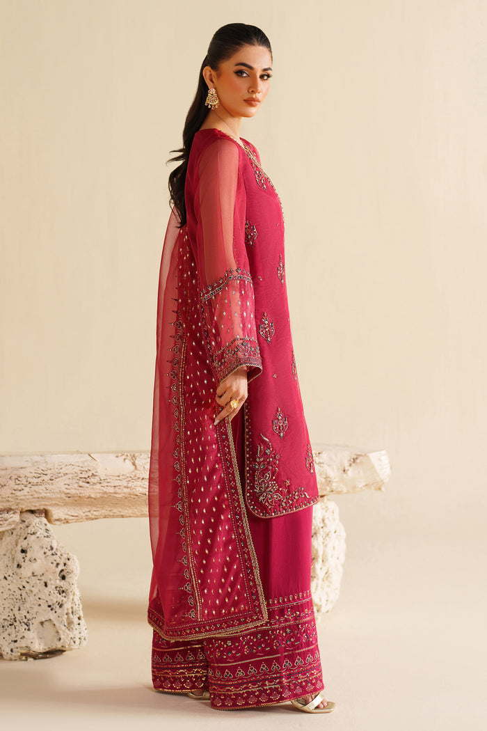 Side view of NAQSHI deep red formal dress highlighting elegant shape, rich embroidery, and event-ready finish