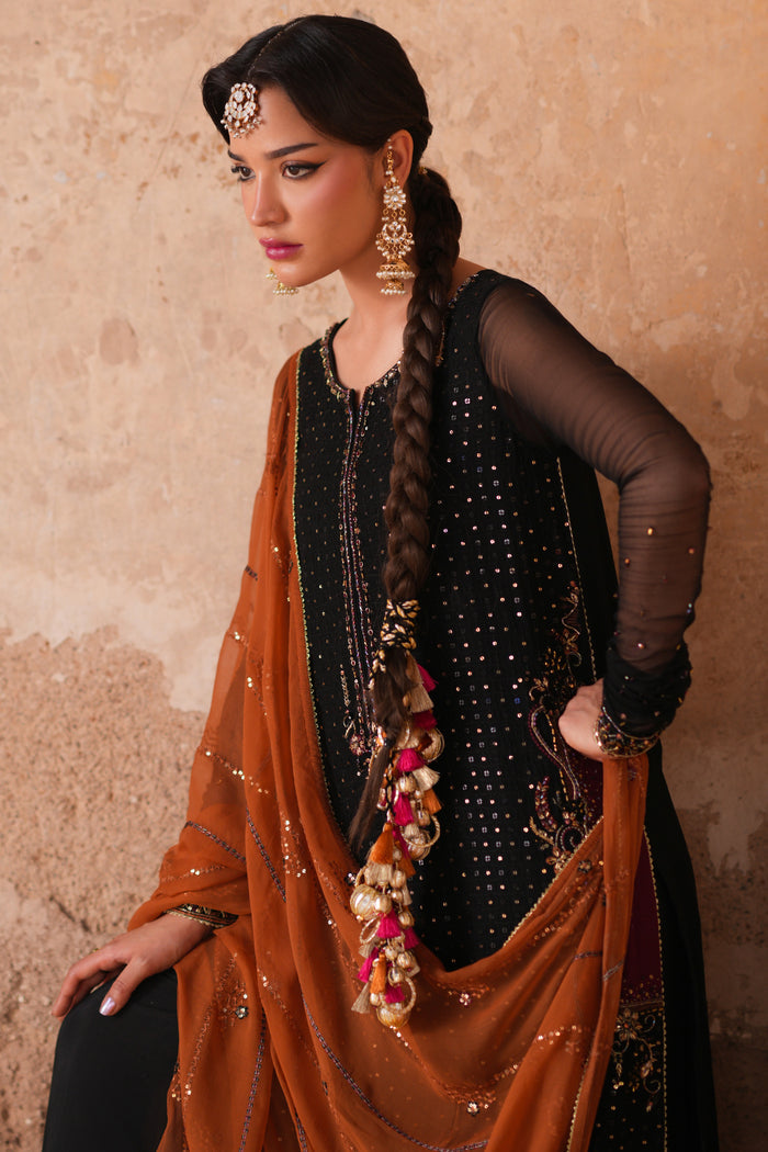 Zarim ready to wear black and orange semi formal outfit showcasing embellished neckline, flowing sleeves and festive occasion styling