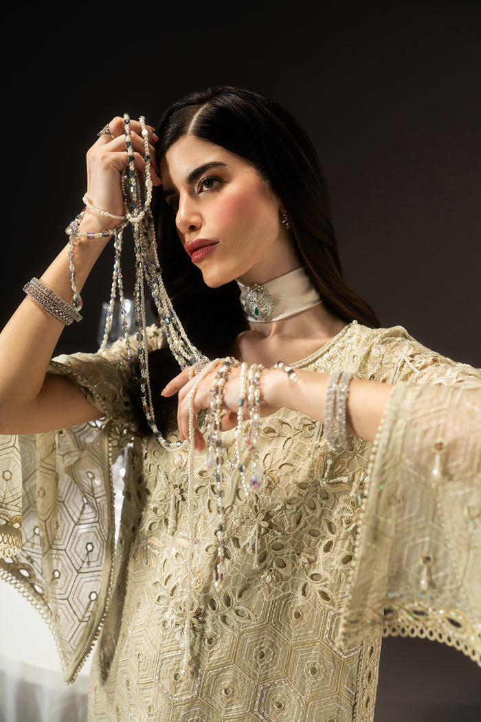 Close-up of Zivah highlighting the boat neckline, 3D floral details, pearl accents and cutwork on the Line Organza shirt.